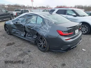2019 BMW 3 Series 330i xDrive with VIN WBA5R7C54KFH24284, listed as a IAAI auction lot 41246406 with 57,200 mi miles. Bid and sale history available at carsss.com. Image 3.