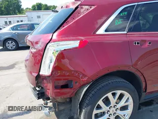 2017 Cadillac XT5 Luxury FWD z VIN 1GYKNBRS3HZ293677, wystawiony jako IAAI lot #42043025 z przebiegiem 89 975 mil mil oraz . Historia ofert i sprzedaży dostępna na DreamBid. Obrazek 18.
