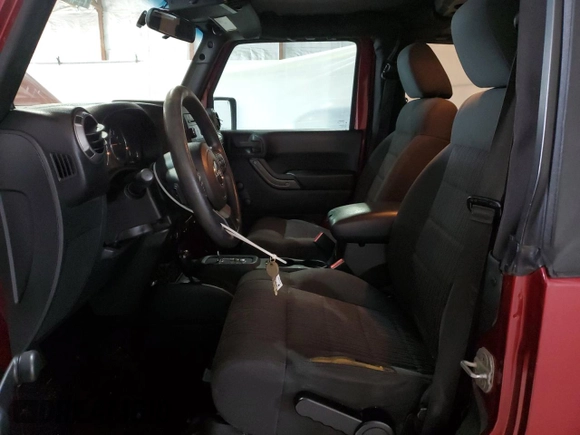 2012 Jeep Wrangler Sport with VIN 1C4AJWAG5CL233049, listed as a Copart auction lot 52328865 with 185,388 mi miles and Salvage title. Bid and sale history available at DreamBid. Image 7.