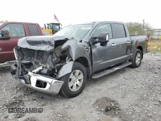 2017 Nissan Titan SL with VIN 1N6AA1E6XHN516947, listed as a Copart auction lot 46406075 with 194,321 mi miles and Salvage title. Bid and sale history available at DreamBid. Image 1.