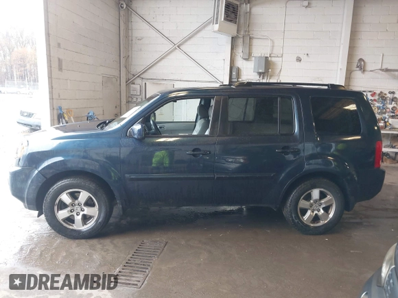 2011 Honda Pilot EX-L with VIN 5FNYF4H66BB020176, listed as a IAAI auction lot 41973659 with 238,745 mi miles and . Bid and sale history available at carsss.com. Image 14.