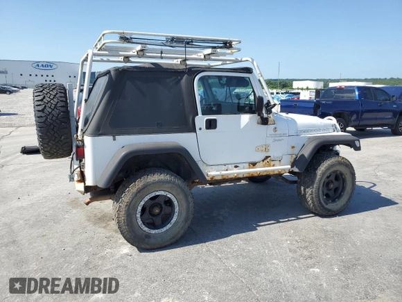 1999 Jeep Wrangler Sport with VIN 1J4FY19SXXP464096, listed as a Copart auction lot 61233105 with 167,350 mi miles and Clean title. Bid and sale history available at DreamBid. Image 3.