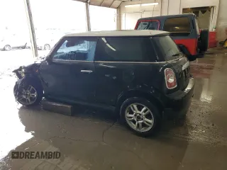 2011 MINI Hardtop with VIN WMWSU3C59BT099759, listed as a Copart auction lot 53995355 with 141,575 mi miles and Salvage Title. Bid and sale history available at DreamBid. Image 2.
