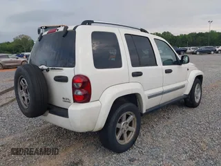 2005 Jeep Liberty Limited with VIN 1J4GL58KX5W632558, listed as a IAAI auction lot 42143440 with 214,079 mi miles and . Bid and sale history available at carsss.com. Image 4.