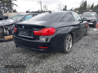 2014 BMW 4 Series 428i with VIN WBA3N3C50EK230489, listed as a IAAI auction lot 41613944 with 86,553 mi miles and . Bid and sale history available at DreamBid. Image 4.