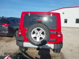2011 Jeep Wrangler Sahara with VIN 1J4AA5D18BL561687, listed as a IAAI auction lot 41435436 with 76,284 mi miles and . Bid and sale history available at DreamBid. Image 17.