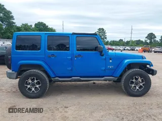 2016 Jeep Wrangler Unlimited 75th Anniversary with VIN 1C4HJWEG0GL154418, listed as a IAAI auction lot 42192717 with 102,514 mi miles and . Bid and sale history available at DreamBid. Image 13.