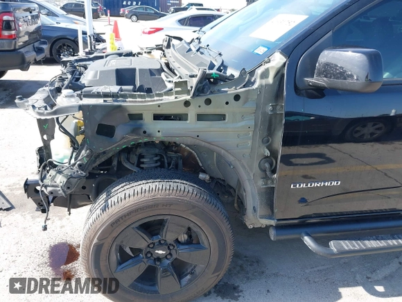 2016 Chevrolet Colorado 2WD LT z VIN 1GCGSCE3XG1213278, wystawiony jako IAAI lot #41931752 z przebiegiem 103 622 mil mil oraz . Historia ofert i sprzedaży dostępna na DreamBid. Obrazek 18.