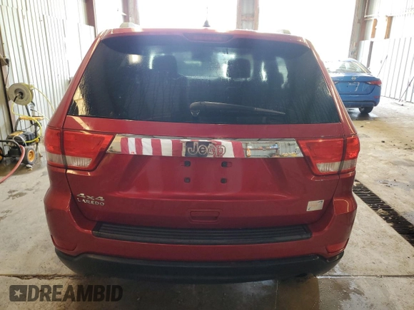 2011 Jeep Grand Cherokee Laredo with VIN 1J4RR4GG3BC669561, listed as a Copart auction lot 63627395 with 99,211 mi miles and Salvage title. Bid and sale history available at DreamBid. Image 6.