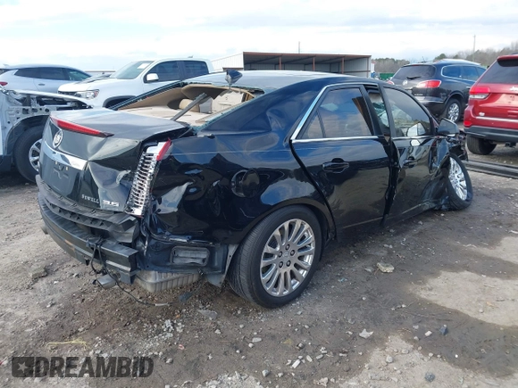 2011 Cadillac CTS Premium with VIN 1G6DP5ED2B0171652, listed as a IAAI auction lot 41229368 with 162,064 mi miles and . Bid and sale history available at DreamBid. Image 4.