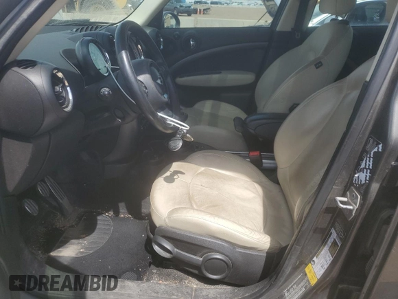 2013 MINI Countryman S ALL4 z VIN WMWZC5C56DWM16203, wystawiony jako Copart lot #54346425 z przebiegiem 148 065 mil mil oraz Szkoda całkowita • Salvage title. Historia ofert i sprzedaży dostępna na DreamBid. Obrazek 7.