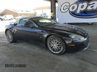 2009 Aston Martin Vantage z VIN SCFBF04CX9GD11858, wystawiony jako Copart lot #53907885 z przebiegiem 87 495 mil mil oraz Szkody całkowita. Historia ofert i sprzedaży dostępna na DreamBid. Obrazek 4.