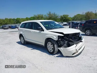 2015 Dodge Journey SE z VIN 3C4PDCAB7FT572716, wystawiony jako IAAI lot #42010091 z przebiegiem 186 489 mil mil oraz . Historia ofert i sprzedaży dostępna na DreamBid. Obrazek 1.