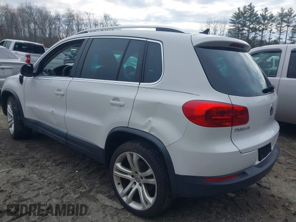 2012 Volkswagen Tiguan S with VIN WVGBV7AX0CW543697, listed as a IAAI auction lot 41853077 with 113,002 mi miles and . Bid and sale history available at DreamBid. Image 3.