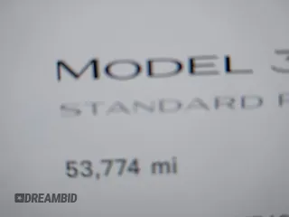 2019 Tesla Model 3 Mid Range with VIN 5YJ3E1EA3KF466418, listed as a IAAI auction lot 41724564 with 53,774 mi miles and . Bid and sale history available at DreamBid. Image 15.