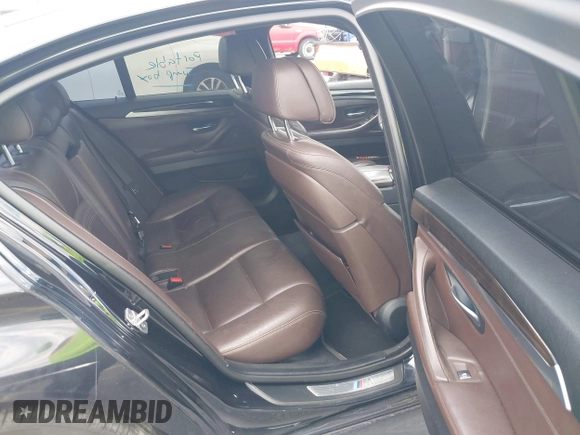 2016 BMW 5 Series 535i xDrive with VIN WBA5B3C5XGG256900, listed as a IAAI auction lot 42333358 with 128,904 mi miles and . Bid and sale history available at DreamBid. Image 8.