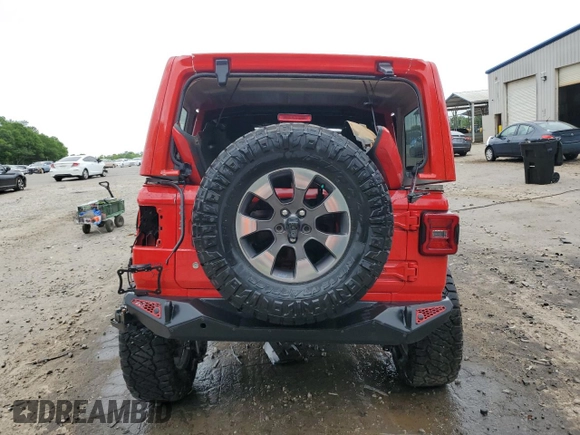 2018 Jeep Wrangler Unlimited Sahara with VIN 1C4HJXEG9JW146717, listed as a Copart auction lot 55062845 with 148,844 mi miles and Salvage title. Bid and sale history available at DreamBid. Image 6.