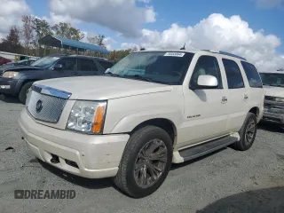 2004 Cadillac Escalade z VIN 1GYEC63T04R277457, wystawiony jako Copart lot #78555564 z przebiegiem 170 153 mil mil oraz Szkody całkowita. Historia ofert i sprzedaży dostępna na DreamBid. Obrazek 1.