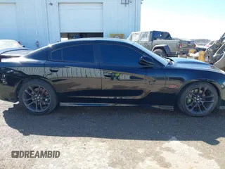 2020 Dodge Charger Scat Pack z VIN 2C3CDXGJ5LH162266, wystawiony jako IAAI lot #41763759 z przebiegiem 83 366 mil mil oraz . Historia ofert i sprzedaży dostępna na DreamBid. Obrazek 13.