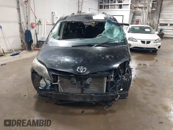 2011 Toyota Sienna SE with VIN 5TDXK3DC1BS172813, listed as a IAAI auction lot 41643352 with 172,385 mi miles. Bid and sale history available at carsss.com. Image 13.