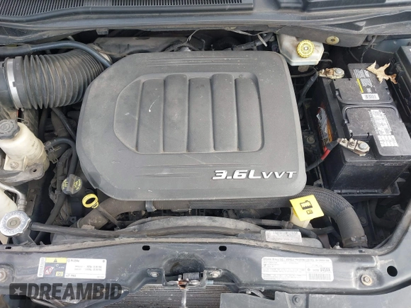 2013 Dodge Grand Caravan Crew with VIN 2C4RDGDG9DR740086, listed as a IAAI auction lot 41362852 with 145,881 mi miles and . Bid and sale history available at DreamBid. Image 10.