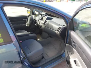 2007 Toyota Prius z VIN JTDKB20U677595987, wystawiony jako IAAI lot #41876974 z przebiegiem 218 650 mil mil oraz . Historia ofert i sprzedaży dostępna na DreamBid. Obrazek 5.