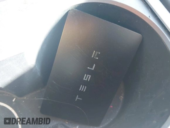 2023 Tesla Model Y Long Range with VIN 7SAYGDEE0PA202150, listed as a IAAI auction lot 41735258 with 22,131 mi miles and . Bid and sale history available at DreamBid. Image 11.