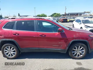 2016 Jeep Cherokee Limited z VIN 1C4PJMDS5GW226671, wystawiony jako IAAI lot #42249438 z przebiegiem 163 204 mil mil oraz . Historia ofert i sprzedaży dostępna na DreamBid. Obrazek 13.
