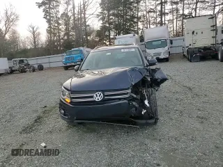 2013 Volkswagen Tiguan S with VIN WVGBV3AX0DW066778, listed as a Copart auction lot 85110984 with 108,027 mi miles and Salvage title. Bid and sale history available at DreamBid. Image 11.