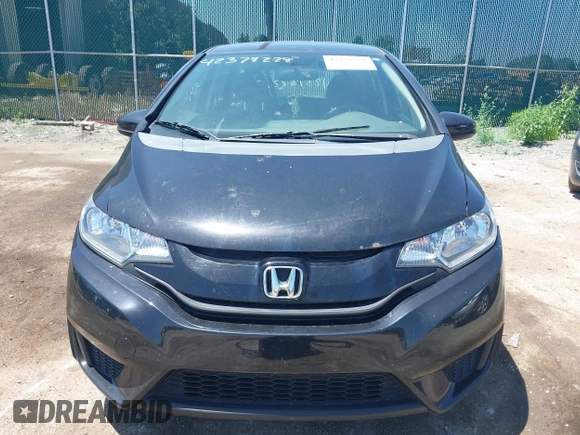 2015 Honda Fit LX z VIN 3HGGK5H56FM712266, wystawiony jako IAAI lot #42378228 z przebiegiem 140 423 mil mil oraz . Historia ofert i sprzedaży dostępna na DreamBid. Obrazek 6.