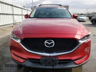 2017 Mazda CX-5 Touring with VIN JM3KFBCL2H0130289, listed as a Copart auction lot 51287885 with 70,170 mi miles and Salvage Title. Bid and sale history available at carsss.com. Image 5.