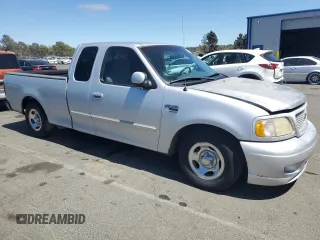 1999 Ford F-150 XL с VIN 1FTRX17L1XKC25356, выставлен на аукционе Copart как лот 65149275 с пробегом 205 482 миль миль и Чистый • Clean title. История ставок и продаж доступна на DreamBid. Изображение 4.