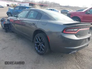 2019 Dodge Charger SXT with VIN 2C3CDXBG8KH668202, listed as a IAAI auction lot 41710007 with 72,640 mi miles. Bid and sale history available at carsss.com. Image 3.