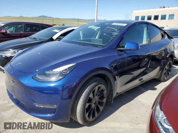 2023 Tesla Model Y Long Range with VIN 7SAYGAEE6PF689615, listed as a Copart auction lot 50999385 with 16,514 mi miles and Salvage Title. Bid and sale history available at DreamBid. Image 1.