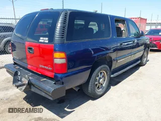 2000 Chevrolet Suburban LS with VIN 3GNEC16T1YG131974, listed as a IAAI auction lot 41983971 with 245,767 mi miles. Bid and sale history available at carsss.com. Image 4.