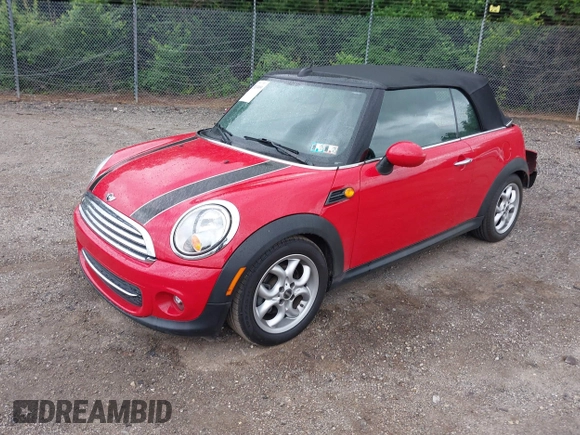 2011 MINI Convertible with VIN WMWZN3C59BTZ89447, listed as a IAAI auction lot 42313009 with 62,009 mi miles and . Bid and sale history available at DreamBid. Image 18.