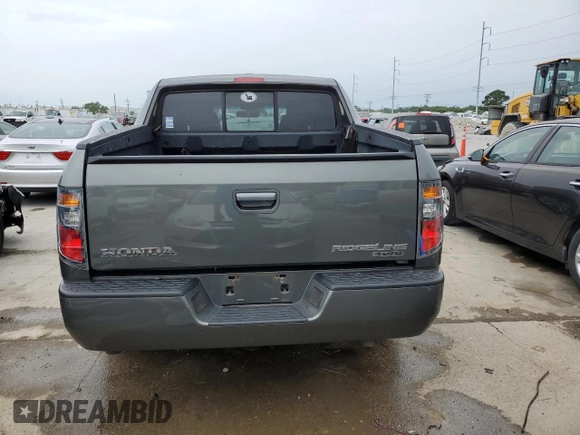2007 Honda Ridgeline RTL z VIN 2HJYK16577H511325, wystawiony jako Copart lot #57619725 z przebiegiem 161 037 mil mil oraz Szkoda całkowita • Salvage title. Historia ofert i sprzedaży dostępna na DreamBid. Obrazek 6.
