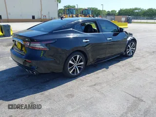 2021 Nissan Maxima SV with VIN 1N4AA6CV4MC506744, listed as a IAAI auction lot 42150465 with 70,056 mi miles and . Bid and sale history available at DreamBid. Image 4.