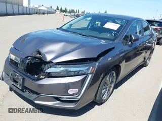 2018 Honda Clarity Touring z VIN JHMZC5F33JC021811, wystawiony jako IAAI lot #42272808 z przebiegiem 82 414 mil mil oraz . Historia ofert i sprzedaży dostępna na DreamBid. Obrazek 22.