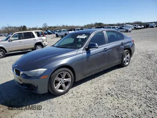 2012 BMW 3 Series 328i with VIN WBA3A5G57CNP16441, listed as a Copart auction lot 49571245 with 140,245 mi miles and Salvage Title. Bid and sale history available at carsss.com. Image 1.
