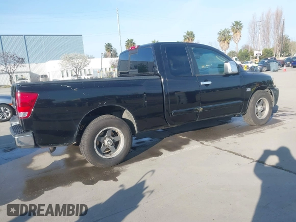 2004 Nissan Titan SE with VIN 1N6AA06A14N574940, listed as a IAAI auction lot 41821005 with 202,373 mi miles. Bid and sale history available at carsss.com. Image 4.