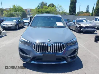 2021 BMW X1 sDrive28i z VIN WBXJG7C02M5T37169, wystawiony jako IAAI lot #42226396 z przebiegiem 48 603 mil mil oraz . Historia ofert i sprzedaży dostępna na DreamBid. Obrazek 13.