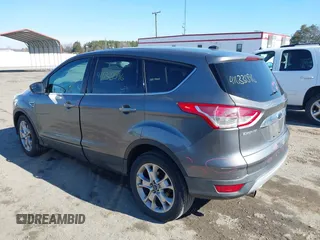 2013 Ford Escape SEL with VIN 1FMCU9H93DUA72572, listed as a IAAI auction lot 41633096 with 190,816 mi miles. Bid and sale history available at carsss.com. Image 3.