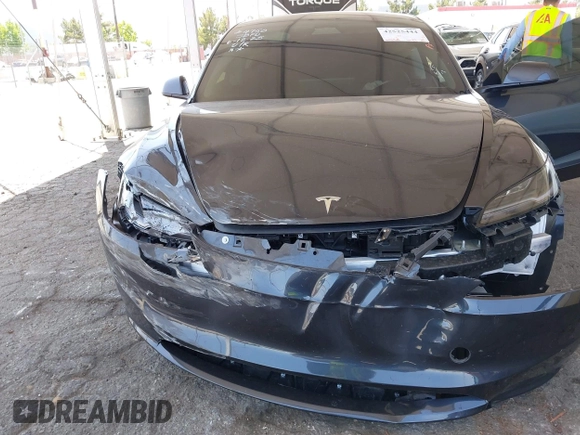 2025 Tesla Model 3 Long Range with VIN 5YJ3E1EA5SF978214, listed as a IAAI auction lot 42525444 with 6,489 mi miles and . Bid and sale history available at DreamBid. Image 6.