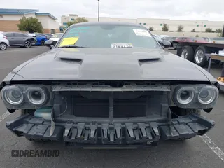 2015 Dodge Challenger R/T with VIN 2C3CDZAT5FH710566, listed as a IAAI auction lot 42042697 with 97,206 mi miles and . Bid and sale history available at DreamBid. Image 13.