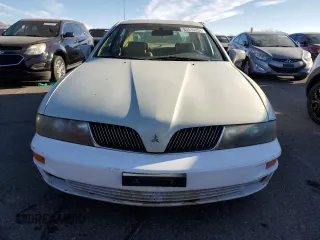 2002 Mitsubishi Diamante LS z VIN 6MMAP67P02T011531, wystawiony jako Copart lot #83510334 z przebiegiem 106 482 mil mil oraz Szkody całkowita. Historia ofert i sprzedaży dostępna na DreamBid. Obrazek 5.
