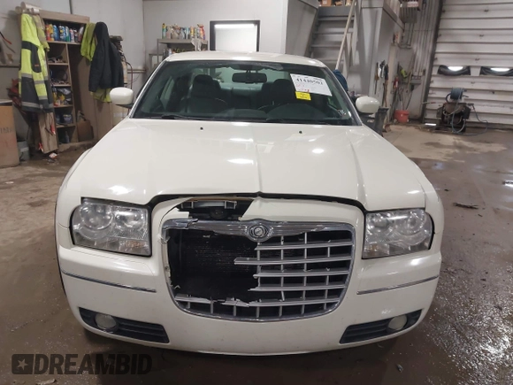 2006 Chrysler 300 Touring with VIN 2C3LK53G76H518015, listed as a IAAI auction lot 41440502 with 117,789 mi miles. Bid and sale history available at carsss.com. Image 12.