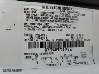 2007 Ford Crown Victoria LX with VIN 2FAFP74V47X119952, listed as a Copart auction lot 71025704 with 220,034 mi miles and Salvage Title. Bid and sale history available at carsss.com. Image 12.