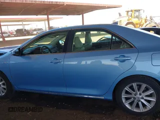 2012 Toyota Camry XLE z VIN 4T1BD1FK8CU003863, wystawiony jako IAAI lot #42336910 z przebiegiem 103 993 mil mil oraz . Historia ofert i sprzedaży dostępna na DreamBid. Obrazek 14.