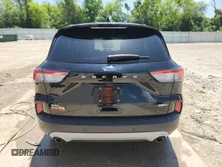 2020 Ford Escape SEL z VIN 1FMCU9H65LUA96795, wystawiony jako Copart lot #61970185 z przebiegiem 51 532 mil mil oraz Szkoda całkowita • Salvage title. Historia ofert i sprzedaży dostępna na DreamBid. Obrazek 6.